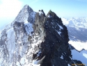 Vrh Glocknerwanda 3721m, zadaj levo Veliki Klek.