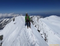 Vsi grebeni zasneženi bolj kot pozimi.